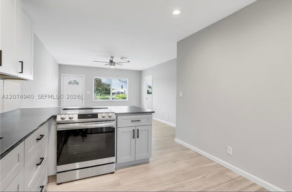 Photo of 2550 N Dixie Hwy #2570, Boca Raton, FL 33431 (MLS # A12074940)