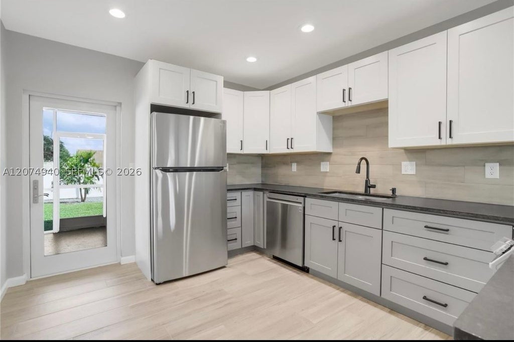 Photo of 2550 N Dixie Hwy #2570, Boca Raton, FL 33431 (MLS # A12074940)