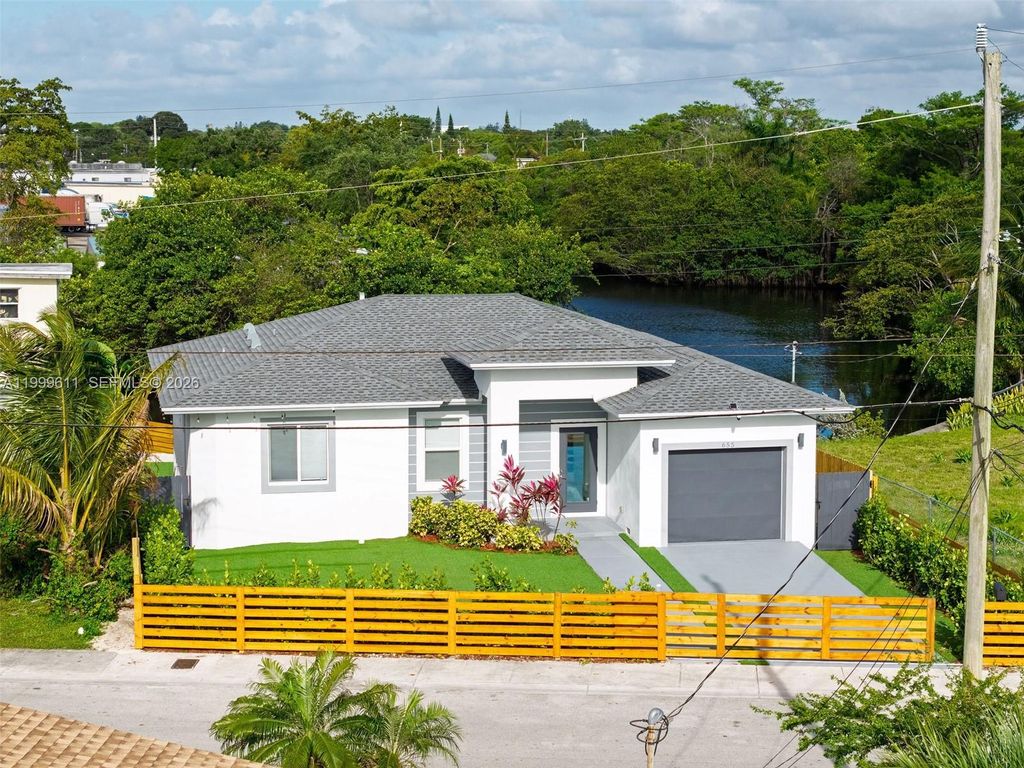 Photo of 655 NW 24 Avenue, Fort Lauderdale, FL 33311 (MLS # A11999611)