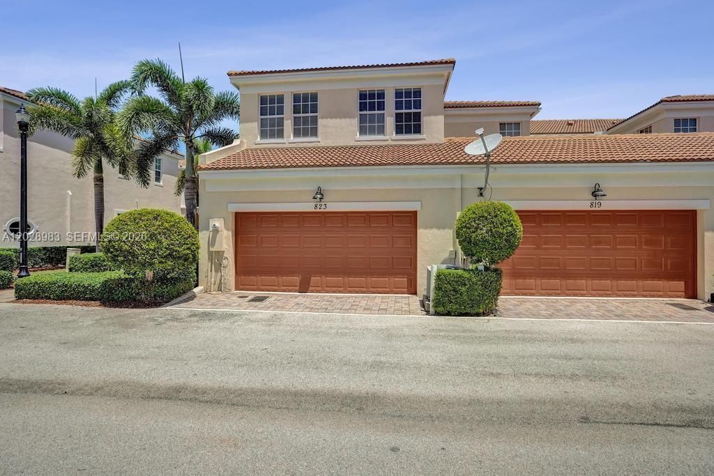 Photo of 823 NW 82nd Ln, Boca Raton, FL 33487 (MLS # A12028983)