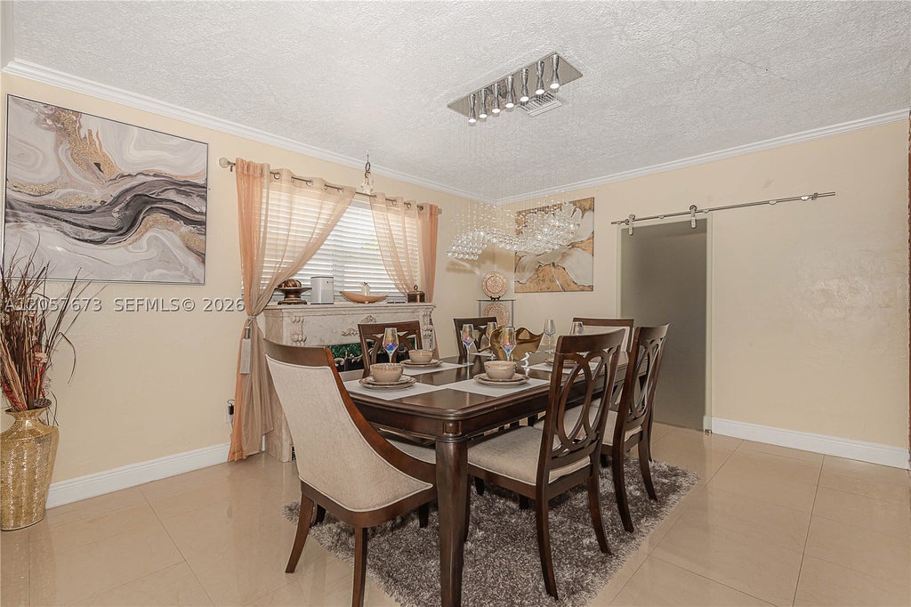 Photo of 5711 Farragut St, Hollywood, FL 33021 (MLS # A12057673)