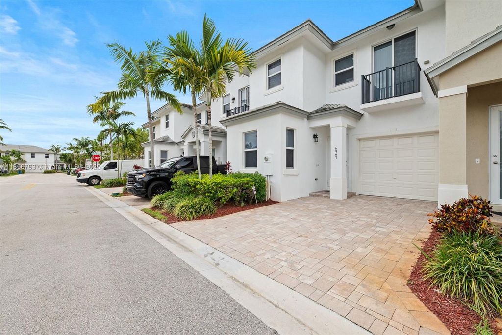 Photo of 6907 Pines Cir #6907, Coconut Creek, FL 33073 (MLS # A11856793)