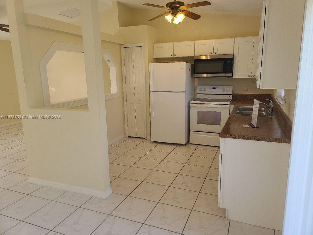 Photo of 729 SE Lansdowne Ave, Port St Lucie, FL 34983 (MLS # A11873769)