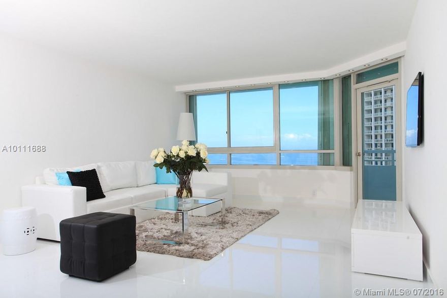 Newly renovated 1 bedroom, 1.5 baths. White glass marble floors throughout.  Open kitchen with white quartz counters.  Full service bldg. with 2 pools, lighted tennis courts, business and media centers and 24 hr fitness center.  High floor views of ocean, South Beach and Govt Cut.  24 hr notice to show.