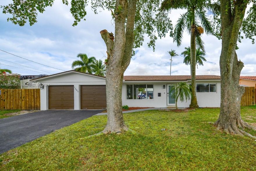 Welcome to Plantation Isles, a historic boating community with ocean access. This 3-bedroom, 2-bathroom pool home features a spacious living room perfect for entertaining guests. New roof installed in June 2022 and hurricane-resistant windows throughout the house. The pool patio has a large covered area for endless entertainment options. No HOA fees. The canal provides ocean access, and the dock can accommodate boats over 40 feet with one fixed bridge. Just 15 minutes from Fort Lauderdale Beach. Close to Plantation Heritage Park, shopping plazas, dining, and minutes from all major highways. "A" rated schools. Plantation Isles is a hidden gem with old-world charm and a boater's paradise. Don't miss this opportunity to live in a hidden jewel.