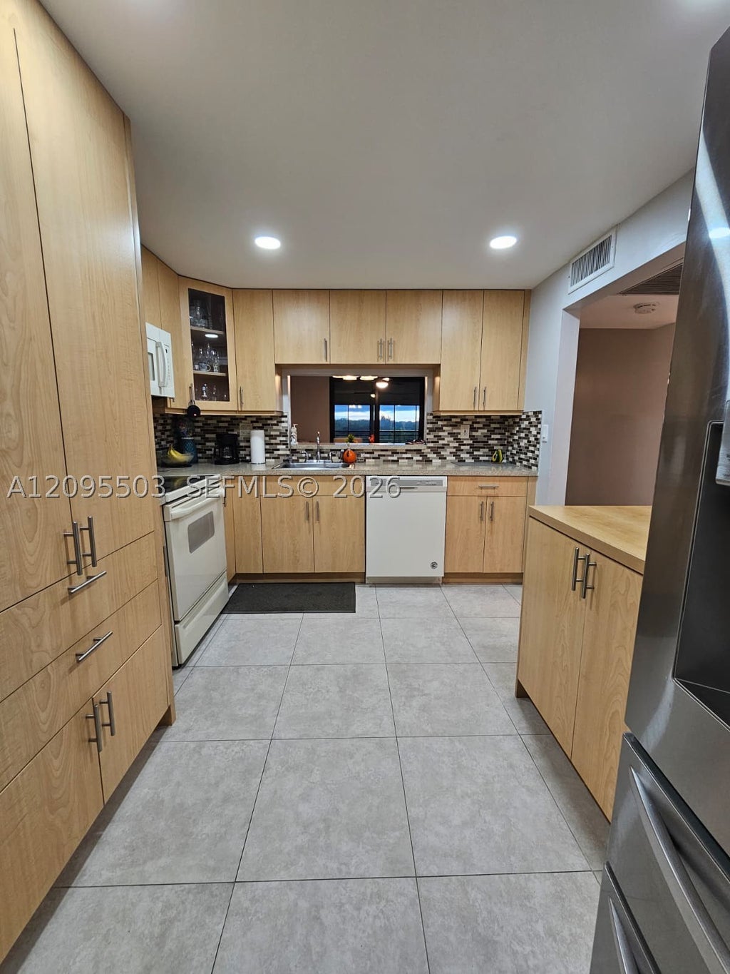Photo of 1000 Colony Point Cir #522, Pembroke Pines, FL 33026 (MLS # A12095503)