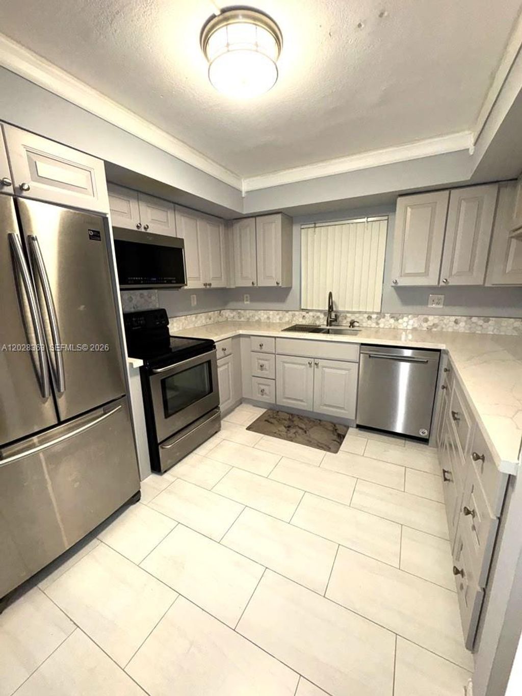Photo of 3263 NW 44th St #2, Oakland Park, FL 33309 (MLS # A12028363)