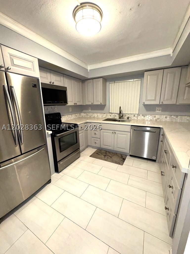 Photo of 3263 NW 44th St #2, Oakland Park, FL 33309 (MLS # A12028363)
