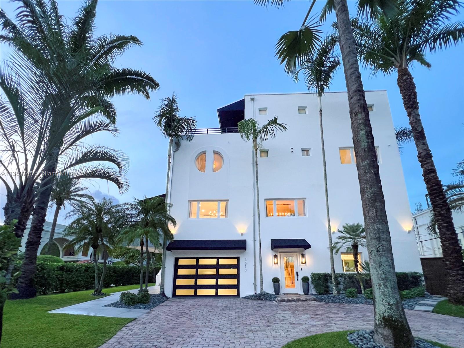 Experience luxury waterfront living in the highly desirable Coconut Grove neighborhood of Miami with this stunning home. Enjoy privacy surrounded by hedges, while a producing mango tree adds a touch of tropical paradise as a vibrant backdrop to your docked boat! This modern home offers a grand exterior on your own lot with no HOA and is move-in ready. Enjoy the best of the outdoors with nearby Kennedy Park and easy access to shopping and top rated dining in the Grove and Brickell. The expansive primary suite offers breathtaking views of the Bay, Brickell, and Kennedy Park, while still enjoying unparalleled privacy. Don't miss out on the chance to live in this home on the water and experience the inspiring natural beauty, wildlife, and vibrant lifestyle of Coconut Grove.
