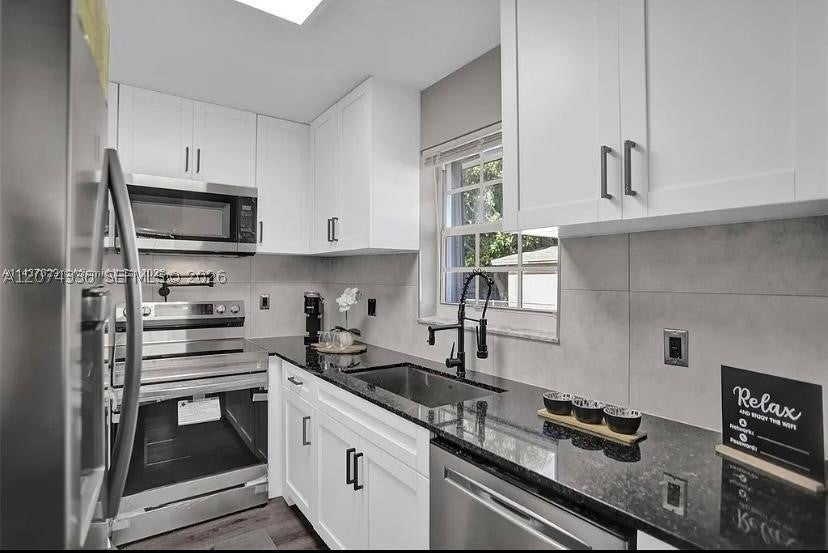 302 NW 9th St