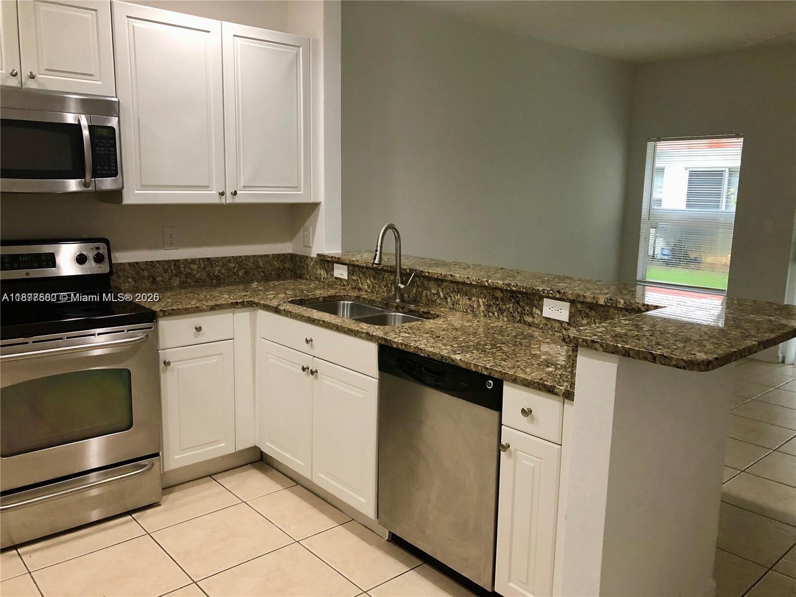 2-story townhouse with private one car garage. Wood laminate upstairs, tile downstairs. 2 bedroom + den. Freshly painted. Full size washer and dryer, ceiling fans and lots of closets and extra storage. Small patio in back. Great location close to major roads and highways. First, last & security to move in, no exceptions. Prospective tenant must be able to verify income and employment and have previous rental history.