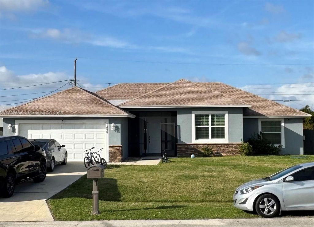 Photo of 1637 SW Daysland Ave, Port St Lucie, FL 34953 (MLS # A11837668)