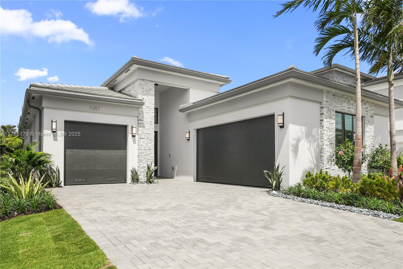 ONE AND ONLY!!!Lotus Edge. Newly built. Bermuda model 3 Bedrooms & 3 1/2 Bath w/ Den, Custom Ceiling Fans & Lighting, Custom Stone & Wood Walls & Wood Flooring, Upgraded Kitchen Cabinets & Stunning marble Backsplash. Gas Appliances w/ 2 Ovens & 5 Burner Cooktop. 5 Ft. High Bronze Fence for Privacy & Security. Backs up to Beautiful Landscaping. Gated Community for your Security. Best schools! Includes Water, Purification System & a Beautiful Custom Front Door. Become a part of luxury living in Boca Raton!