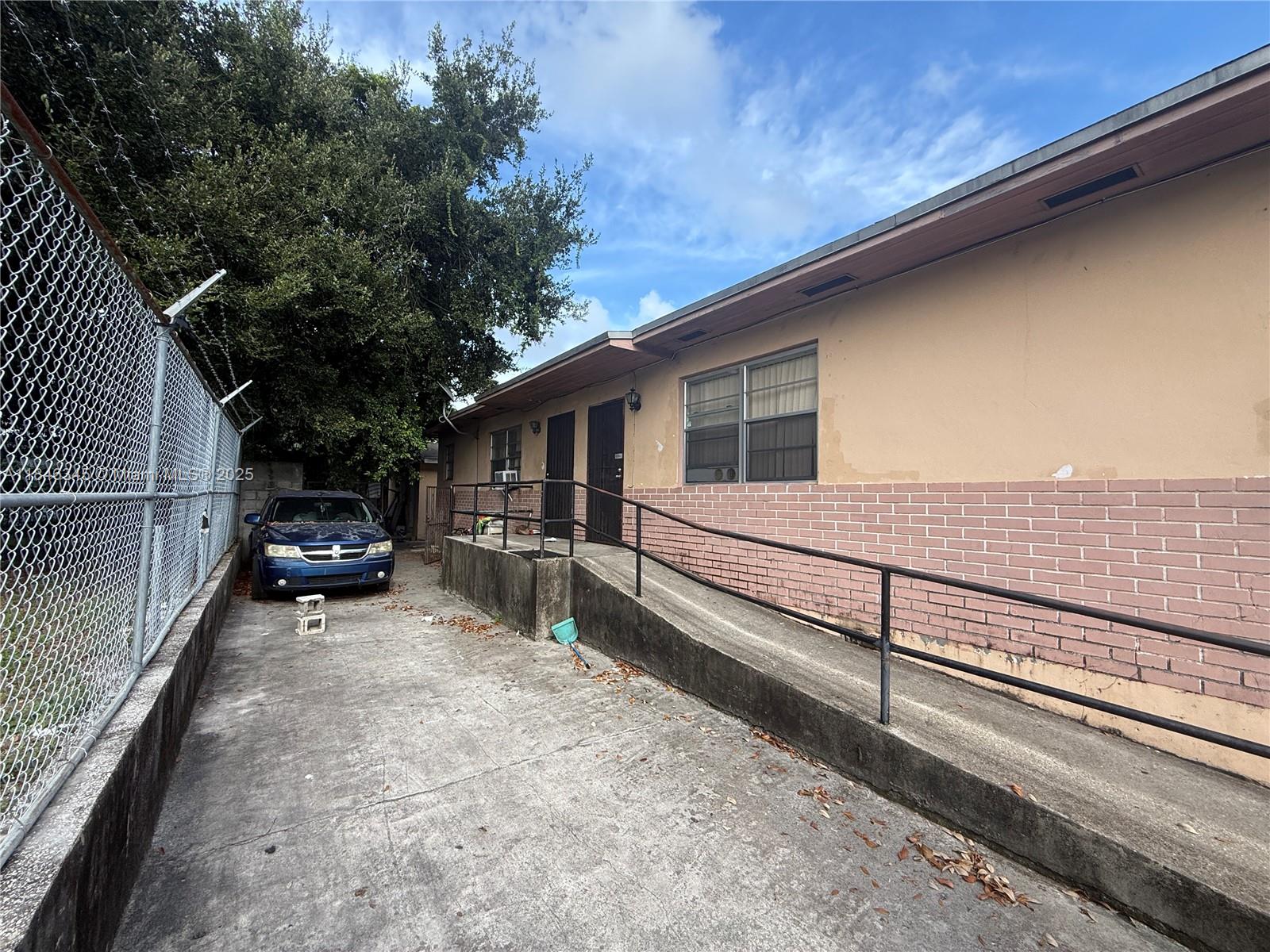 Located on a spacious 6,100 sq ft fenced lot, this versatile 3-unit property in Opa Locka offers excellent rental
income potential. Perfect for investors or owner-occupants, the property features two attached units (each with 2 bedrooms, 1 full bathroom, and a full kitchen). Both units have convenient exit access from the kitchens. The detached unit is a private 1-bedroom, 1-bathroom unit at the back of the property. The property’s layout and secure fencing make it a low-maintenance, income-generating asset with plenty of upside. Located in a desirable area, close to local amenities and transportation, this property presents a
fantastic opportunity to build your real estate portfolio. Don’t miss out on this turnkey investment in Opa Locka—schedule your showing today!