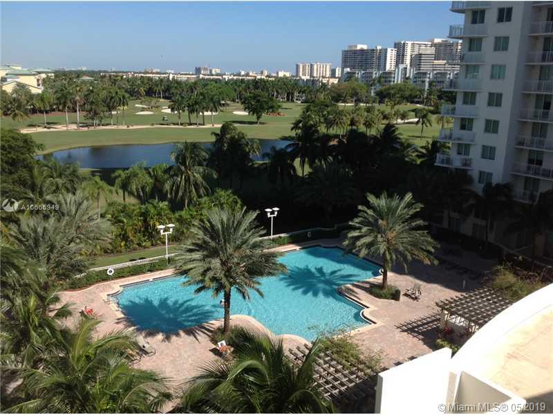 Spacious corner unit with view of pool and golf. Laminate flooring throughout. Luxurious master suite with 2 walk-in closets, spacious step-in glass shower, and roman tub bath. Open kitchen with stainless steel appliances and granite counter tops with center island. Walking distance to all shopping, restaurants, and beach. 
AMENITIES INCLUDE VALET. 24HR. SECURITY, STATE OF THE ART FITNESS CENTER, POOL, BUSINESS CENTER, THEATER ROOM, BILLIARD ROOM. RENT INCLUDES WATER, HI-SPEED INTERNET, CABLE, ADD'L PARKING.