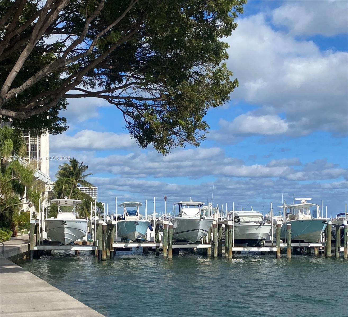 Live the waterfront lifestyle in Brickell Place Phase II. This spacious 1BD/1.5BA (1,005 sq ft) offers unobstructed Biscayne Bay views from every room. Building D remains a peaceful retreat, undisturbed by nearby development, yet steps from the energy of Brickell. A rare highlight: the on-site marina, where boat slips are available exclusively to unit owners—a prized amenity in Miami. Features tile floors, in-unit washer/dryer, and assigned garage parking. Amenities include 2 pools, Jacuzzi, 3 tennis courts, racquetball, squash, sauna, BBQ, game room, playgrounds, store/cafe, and 24/7 security. Rented at $2,800/mo (+$75 parking). 40-year recert complete. No assessments.