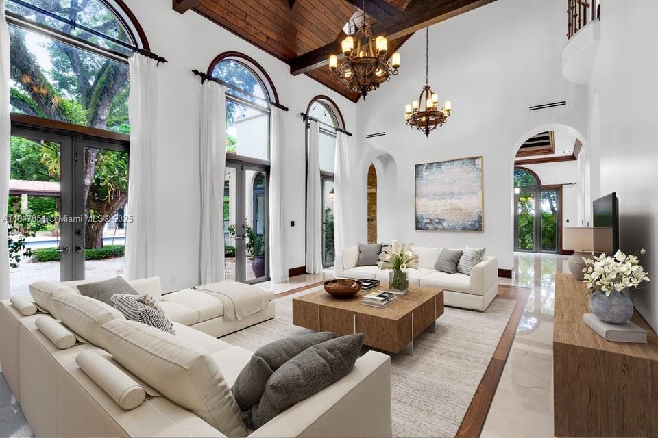 Step into timeless elegance with this stunning Mediterranean estate in coveted Pinecrest. Nestled on a beautifully landscaped, oversized lot, this 9-bed, 9.5 bath residence offers over 9,000 sq ft of refined living space, including two private guest houses. A grand oak-framed entrance leads to an elegant two-story layout with marble and wood floors, a chef's kitchen with top-tier appliances, a luxurious primary suite, a media room, a wine cellar, an elevator, and staff quarters. Enjoy resort-style outdoor living with a large pool, a jacuzzi, garden views, and a 4-car garage. Located in a top school district, this estate blends sophistication, privacy, and modern comfort.
Twenty-four hours in advance is required.