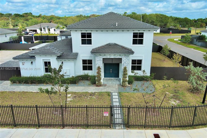 This spacious home features an open-concept layout with the living room, family room, dining area, and large kitchen seamlessly connected. Sliding glass doors open to a covered patio, ideal for indoor-outdoor living. A second floor private hallway leads to each bedrooms with generous closet space.