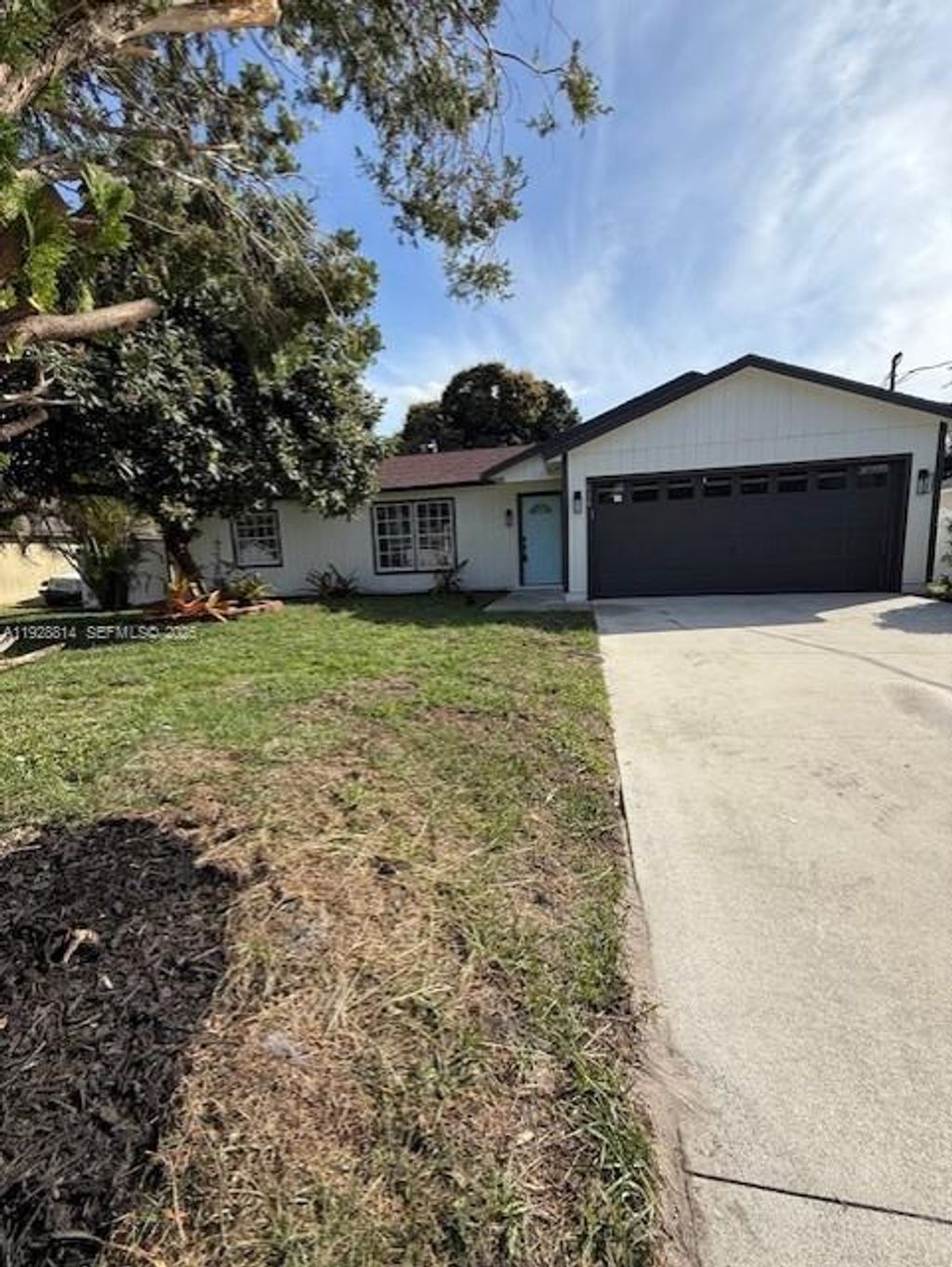 Photo of 938 SW Durham Ter, Port St Lucie, FL 34953 (MLS # A11928814)