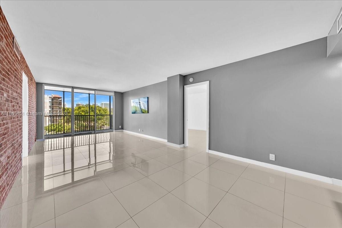 ENJOY THIS BEAUTIFULLY RENOVATED 2 BEDROOM 2 BATH UNIT WITH A BEAUTIFUL GARDEN VIEW OVERLOOKING THE POOL AREA. QUARTZ COUNTERTOP, STAINLESS STEEL APPLIANCES, IN UNIT WASHER/DRYER. SPLIT FLOOR PLAN. RUSTIC BRICK ACCENT WALL IN LIVING AREA, ASSIGNED PARKING SPACE, BUILT - IN CLOSETS. A VERY QUIET WALK - FRIENDLY NEIGHBORHOOD. WALKING DISTANCE TO GOLF COURSE AND AVENTURA MALL. FRESHLY PAINTED. MOVE-IN READY! UTILITIES INCLUDED: WATER, CABLE, INTERNET, SECURITY AND PEST CONTRO