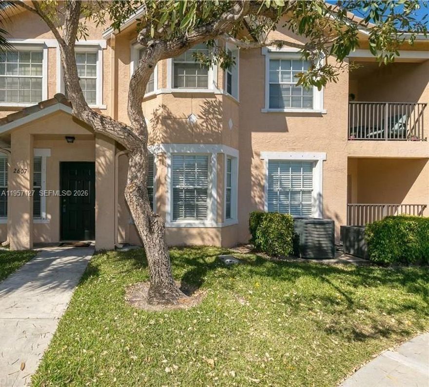 Rarely available unit in Belmont! This is your perfect condo/townhouse unit with 2 car garage! This unit boasts an updated kitchen with quartz countertops and stainless steel appliances. Additionally, the unit includes hurricane shutters and a storage/laundry room. Bathrooms have been updated.  Safe, gated community conveniently located near a shopping center. Your search is over. AS IS.