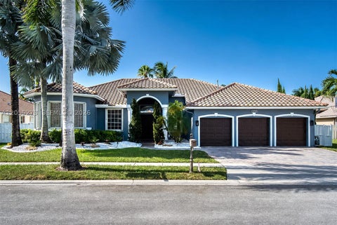 Photo of 13755 NW 18th Ct, Pembroke Pines, FL 33028 (MLS # A12055273)