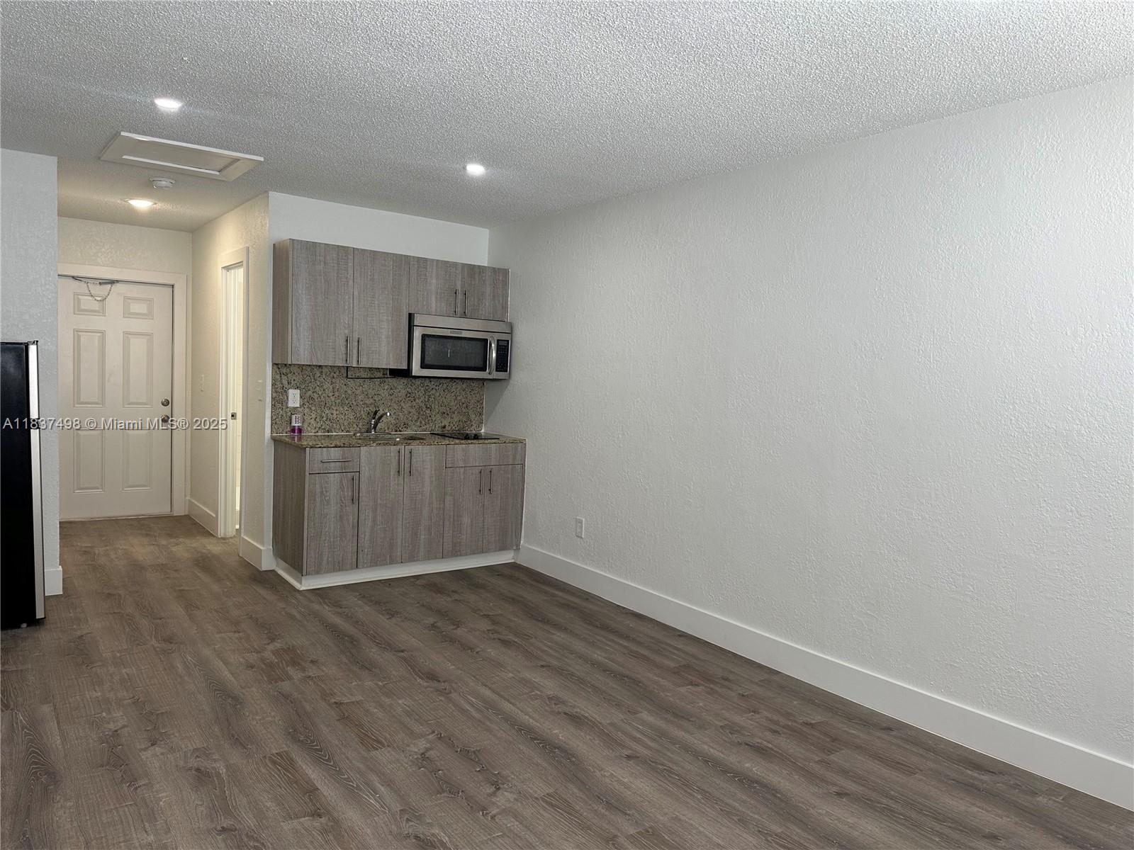 BEAUTIFUL, NEWLY REMODELED STUDIO APARTMENT CENTRALLY LOCATED IN HOLLYWOOD!!! Cute, spacious turn-key, corner unit on the 2nd floor. Features open floor plan layout, new wood flooring, modern cabinets, new lighting and appliances, kitchen + bathroom upgrades, and new AC. Newly renovated property! Located on a quiet residential street. Great location - walking distance to great parks, schools, restaurants. Close to Hollywood Blvd, Beaches, Young Circle Park, Downtown Hollywood, Downtown Hollywood Art Walk, Hollywood Beach Golf Club, and major highways such as A1A, US1, I-95 etc. 10 minutes to Hollywood Beach!!! Laundry facilities in building. Water, waste, sewer, electric and maintenance included in rent + 1 assigned parking space. Pets welcome with 1x small non-refundable pet fee.