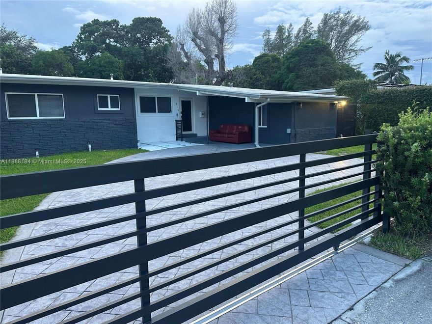 Beautifully updated 3 bed/2 bath single home in North Miami Beach with spacious open layout and large fenced backyard. Features modern kitchen w/ granite counters & 1-year-old stainless appliances, updated baths, tile floors, impact windows, security cameras, and extra den. Covered patio perfect for outdoor living. Bright and airy throughout. Conveniently located near I-95, Palmetto, Turnpike, airports & downtown. Ideal for families. (Ask about adding a 3rd bath.) Owner may complete upgrades during tenancy with tenant cooperation.