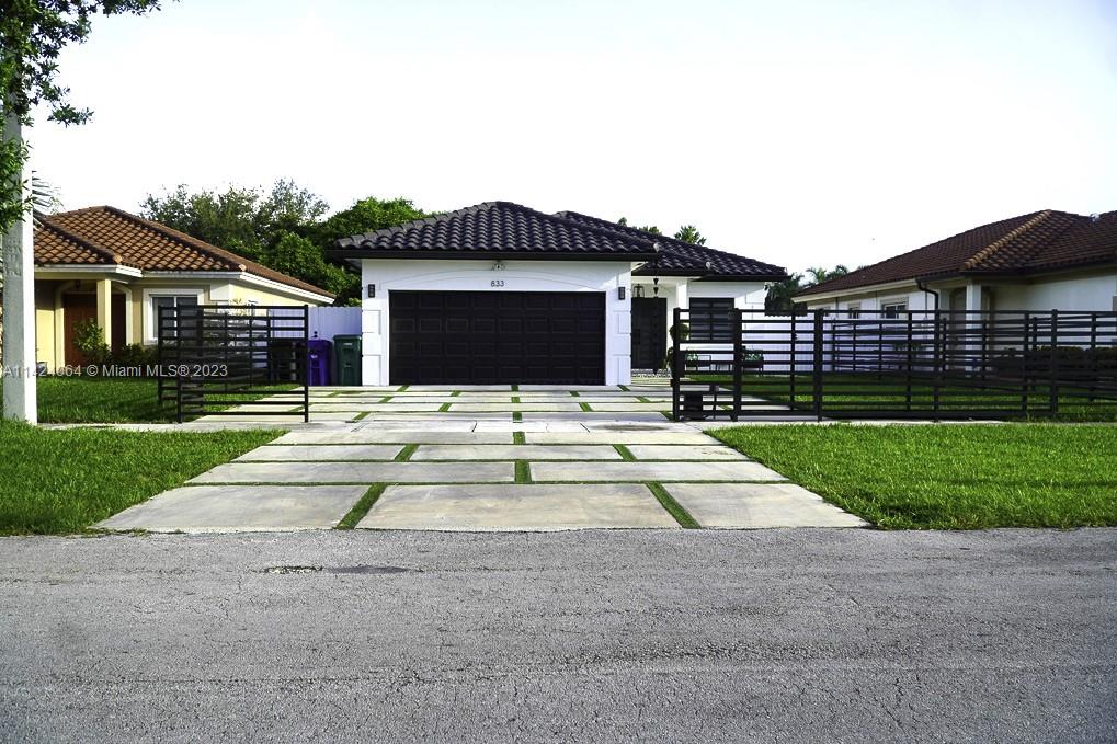 Come check out this beautiful, modern style like new one-story home meant for a large family. Owners kept the home immaculate! Pull into your electrical gate onto the low-maintenance Turfstone paved drive way with enough parking for yourself and guests. Enjoy privacy with your fenced-in backyard with room for a pool and outdoor family fun under the covered back patio. Updated cabinetry with granite countertops in kitchen and bathrooms. Up to date stainless steel appliances included. Window treatments are hassle free zebra-styled blinds. Recessed lighting throughout the home provides great lighting. Newer AC installed January 2022. NO HOA! Washer and Dryer included, but dryer does not work. Quick closing offers are preferred, but of course ALL offers will be considered.