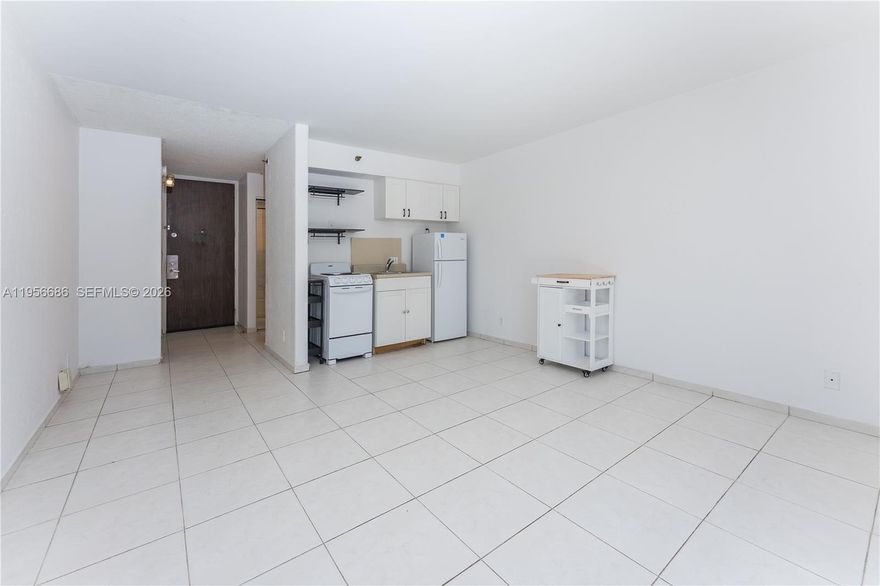 This studio apartment offers a perfect blend of comfort and accessibility, located conveniently near a major highway. The entire building has recently been painted, and the pool has been fully restored, offering a refreshing retreat. Inside, you’ll find a clean, working, and well kept stove, refrigerator, and freezer in the efficient kitchen area. This studio features one bathroom and includes one dedicated parking space, providing an ideal, low-maintenance living space. Rent includes water and electricity.