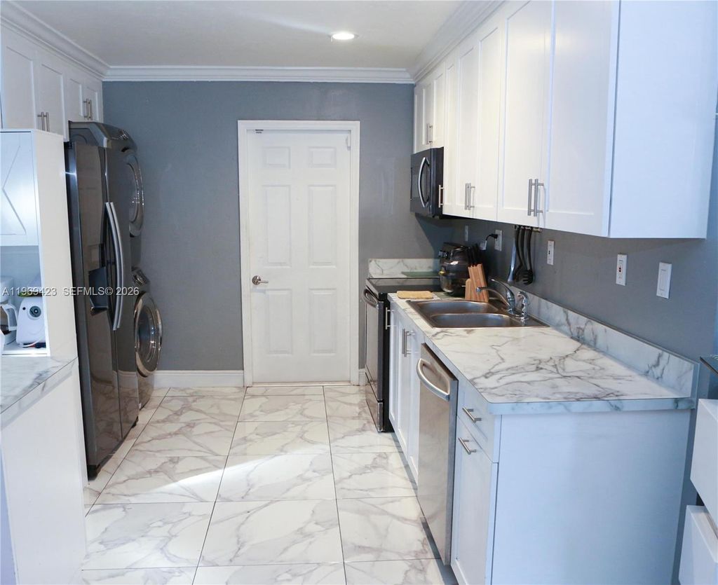 Photo of 1013 Cherry Rd, West Palm Beach, FL 33409 (MLS # A11969423)