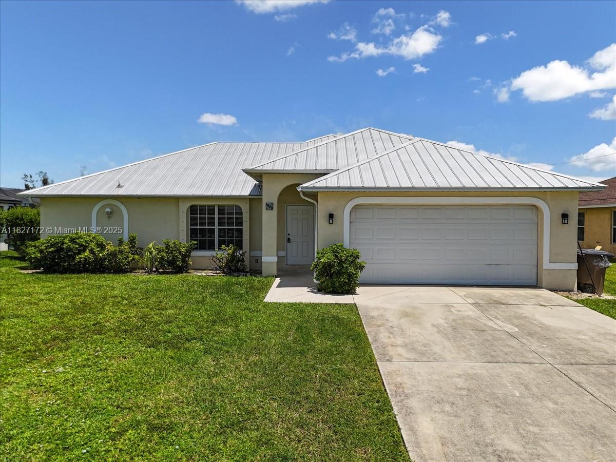 Welcome to your perfect Florida retreat! This beautifully updated 4-bedroom, 2-bathroom home is nestled along a freshwater canal, offering stunning views and a peaceful atmosphere right from your screened-in lanai. Step inside to find a spacious, all-tile interior freshly painted both inside and out. The heart of the home is a chef-inspired kitchen featuring a large island—perfect for meal prep or entertaining guests. The open living area provides plenty of room to relax and unwind, while the inside laundry room adds everyday convenience. Centrally located near shopping, top-rated restaurants, and the world-famous Southwest Florida beaches, this home offers the ideal blend of tranquility and accessibility. ? Lawn service included in the rent – just move in and enjoy!