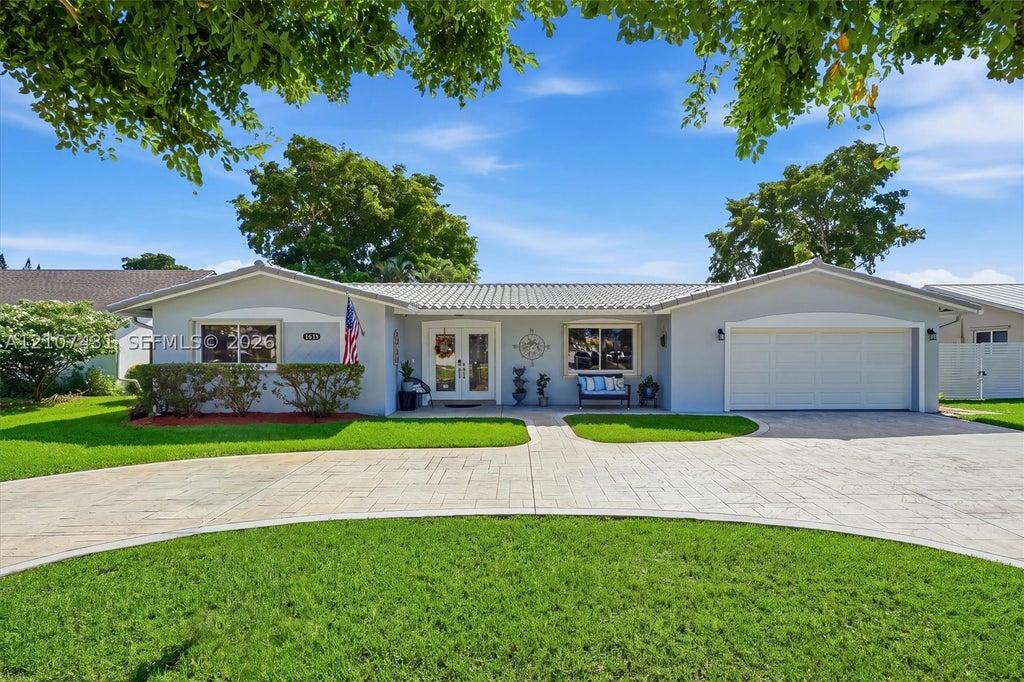 Photo of 1631 NW 109th Ter, Pembroke Pines, FL 33026 (MLS # A12107431)