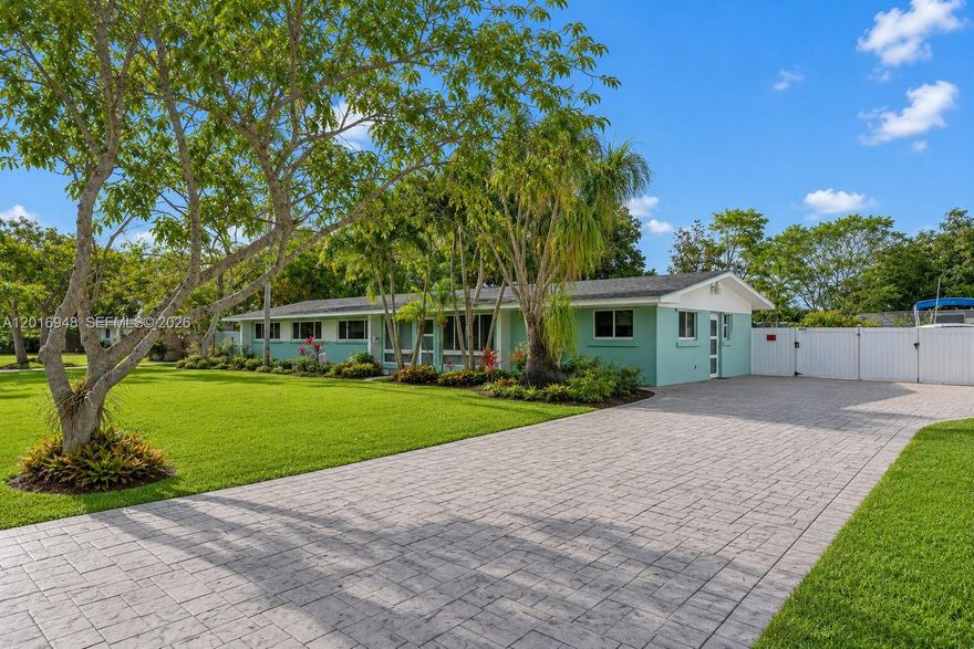 Welcome to 9340 SW 178 Street — a beautifully updated pool home that blends modern comfort with true South Florida living. Set on an impressive 16,560 sq ft lot, this residence stands out from the moment you arrive with clean curb appeal, mature landscaping and a private feel that is hard to find in today’s market. Step inside to an open floorplan filled with natural light, plantation shutters, impact windows and a large family room that creates the perfect setting for everyday living and effortless entertaining. The remodeled kitchen serves as the heart of the home with quartz countertops, solid wood cabinetry and stainless steel appliances, offering a clean, timeless design. The home features a newer roof, PVC PIPES, remodeled guest bath and a thoughtful layout that maximizes space and comfort. Outdoors, the oversized yard is where the property truly shines. The 16k lot provides room for a boat, RV, future additions and still leaves plenty of green space to enjoy. Fruit trees, a sparkling pool and covered areas make this the kind of backyard families dream about — private, peaceful and built for gatherings. Located in a quiet, established neighborhood near top schools, parks, restaurants, Black Point Marina and major roadways, 9240 SW 178 Terrace offers the rare combination of space, upgrades and prime location. 4th bedroom is a den.