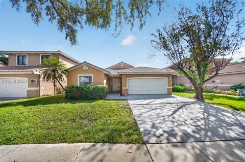 Photo of 4931 SW 152nd Ave, Miramar, FL 33027 (MLS # A12104057)