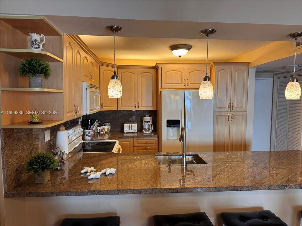 Photo of 3725 S Ocean Dr #421, Hollywood, FL 33019 (MLS # A11999839)