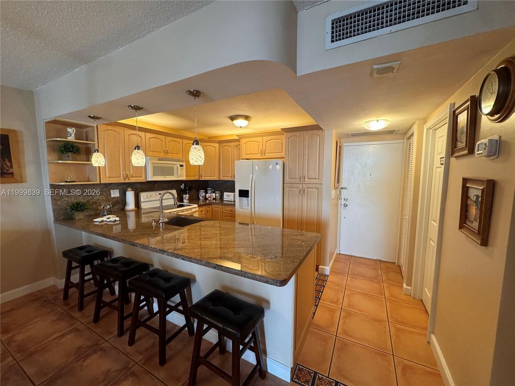Photo of 3725 S Ocean Dr #421, Hollywood, FL 33019 (MLS # A11999839)