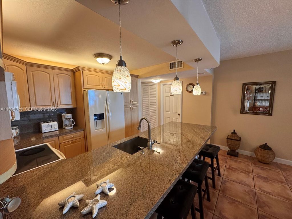 Photo of 3725 S Ocean Dr #421, Hollywood, FL 33019 (MLS # A11999839)
