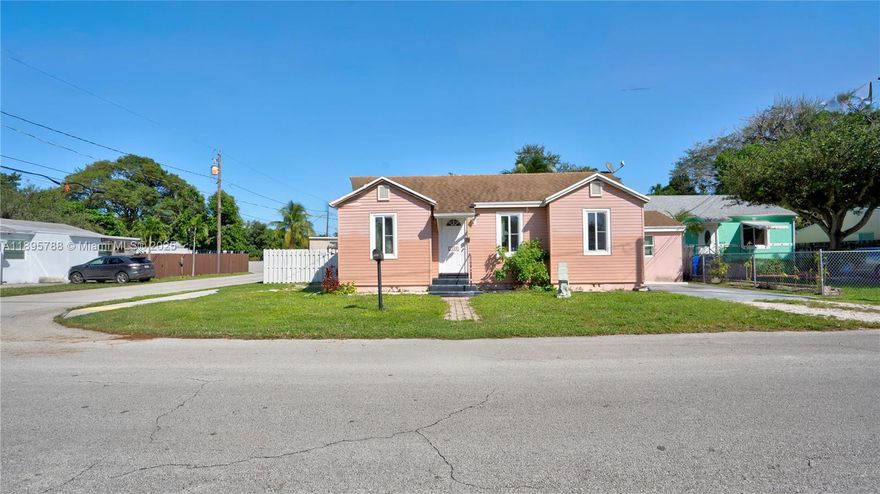Great opportunity in a central location! This charming 3-bedroom, 2-bath home features a bright, open layout with a covered back porch, utility area, and private driveway. The spacious yard offers plenty of room for outdoor living or future expansion. Zoned RM-9 (verify with city) with potential for up to 9 units and includes well water for added convenience and savings. Conveniently located near I-95, the Turnpike, Fort Lauderdale Airport, and Hollywood Beach, providing easy access to all South Florida has to offer. This property is in an eligible City of Hollywood area that may assist buyers with up to $50,000 toward closing costs and down payment (buyer to verify). Sold as-is. Buyer to verify all details.