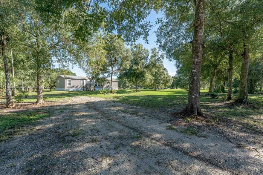 Embrace peaceful country living with this move-in ready home on 4.63± acres! With plenty of space for horses, livestock, gardens, or simply room to roam, this property offers the perfect blend of comfort and freedom. Inside, the open island kitchen flows seamlessly into the dining area—an inviting space for family meals and gatherings. Recent updates include a brand-new well and water system, new septic system, newer stainless-steel appliances, easy-care vinyl flooring in the living areas, and fresh carpet in the bedrooms. Bring your dreams and make this your own slice of country paradise!