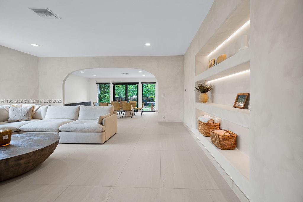 Welcome to Boho House, a charming three bedroom 2 1/2 bathroom in the heart of Hollywood Lakes. Boho House got its name from its extensive renovations that were done in 2023 - including new flooring throughout, limewash, an addition of a double fridge & freezer, new Electrolux washer and dryer, a wet bar and more. Boho House is just a 3 minute drive and a 10 minute bike ride to Hollywood boardwalk, a five minute drive from Young Circle, and minutes away from a variety of temples and churches. Large back yard with approved plans for a pool and spa.