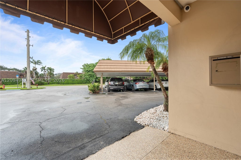 Photo of 145 Atlantis Blvd #101, Atlantis, FL 33462 (MLS # A12094947)