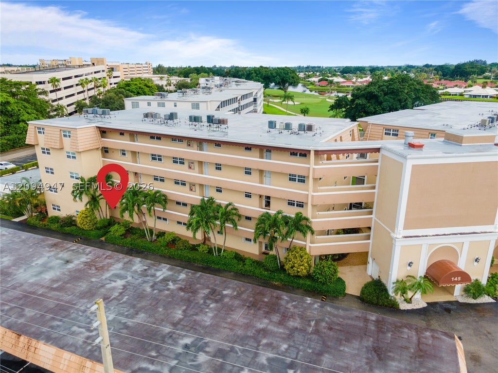 Photo of 145 Atlantis Blvd #101, Atlantis, FL 33462 (MLS # A12094947)