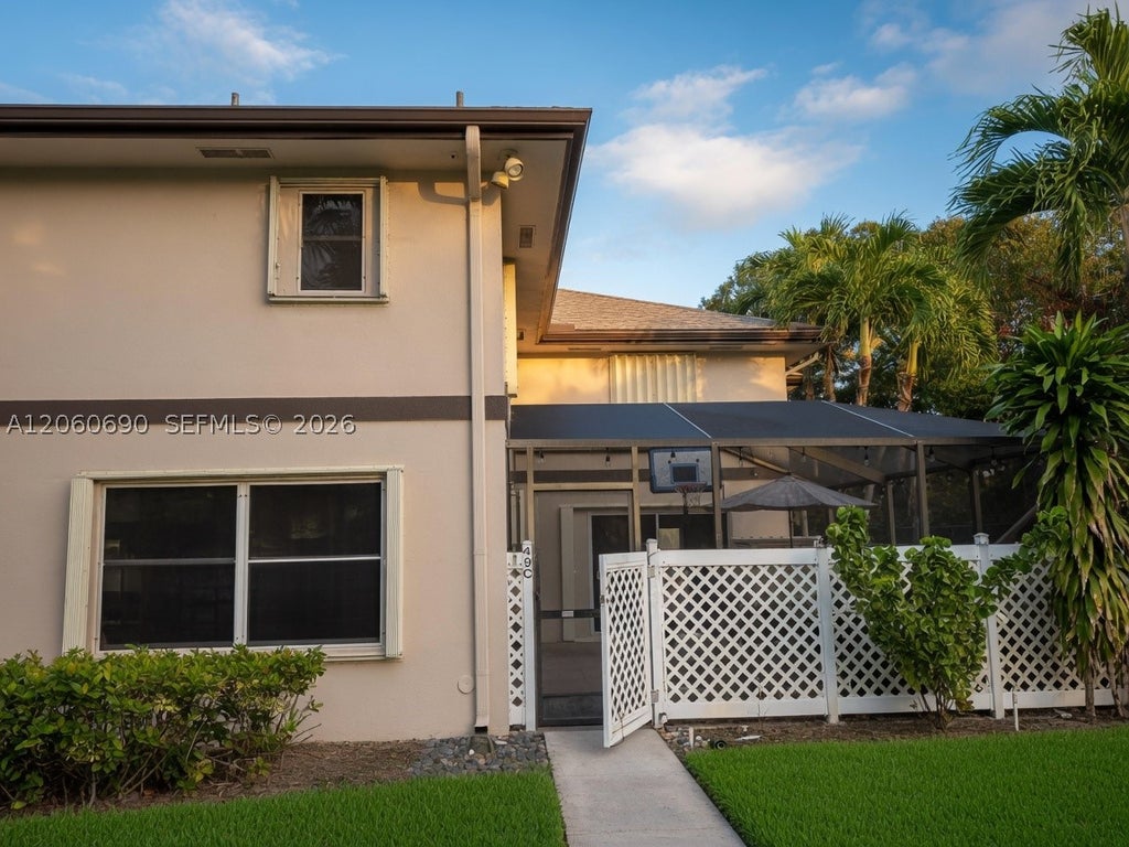 Photo of 49 Essex Ct #C, Royal Palm Beach, FL 33411 (MLS # A12060690)