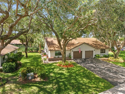 Photo of 4148 N Palm Forest Dr N, Delray Beach, FL 33445 (MLS # A12033275)