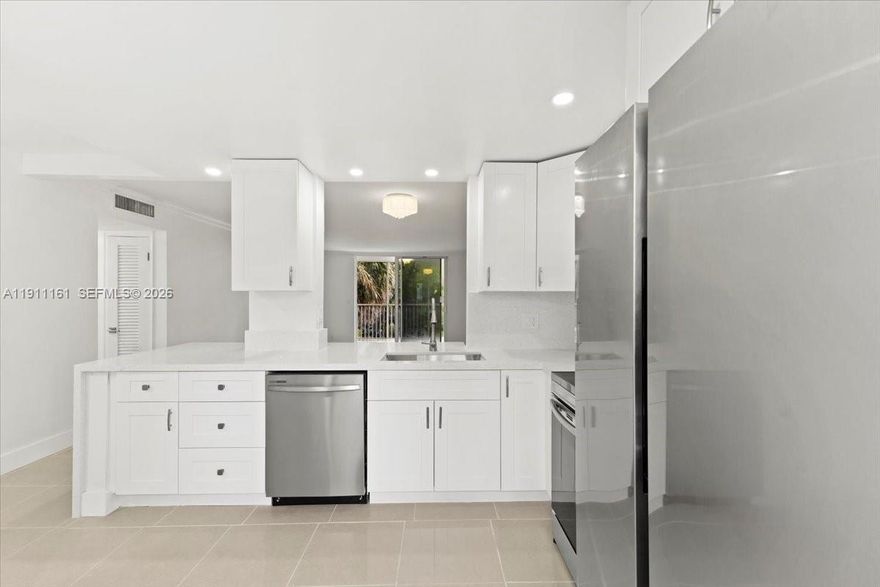 Completely remodeled corner unit 2-bedroom, 2-bath condo featuring hurricane-impact windows, abundant natural light, and a spacious open layout. This stylish home offers a modern kitchen with quartz countertops, beautifully updated bathrooms with lighted mirrors, and generously sized bedrooms with ample closet space, plus a private balcony to enjoy the Florida lifestyle. Meadowbrook recently installed a new roof (2024) and provides outstanding amenities including a pool, fitness center, sauna, clubhouse, BBQ area, and guest parking. Ideally located just minutes from Aventura Mall, Gulfstream Park, shopping, dining, and the beaches, this residence is perfect as a primary home, vacation retreat, or investment property, with rentals allowed after one year. Se habla español.