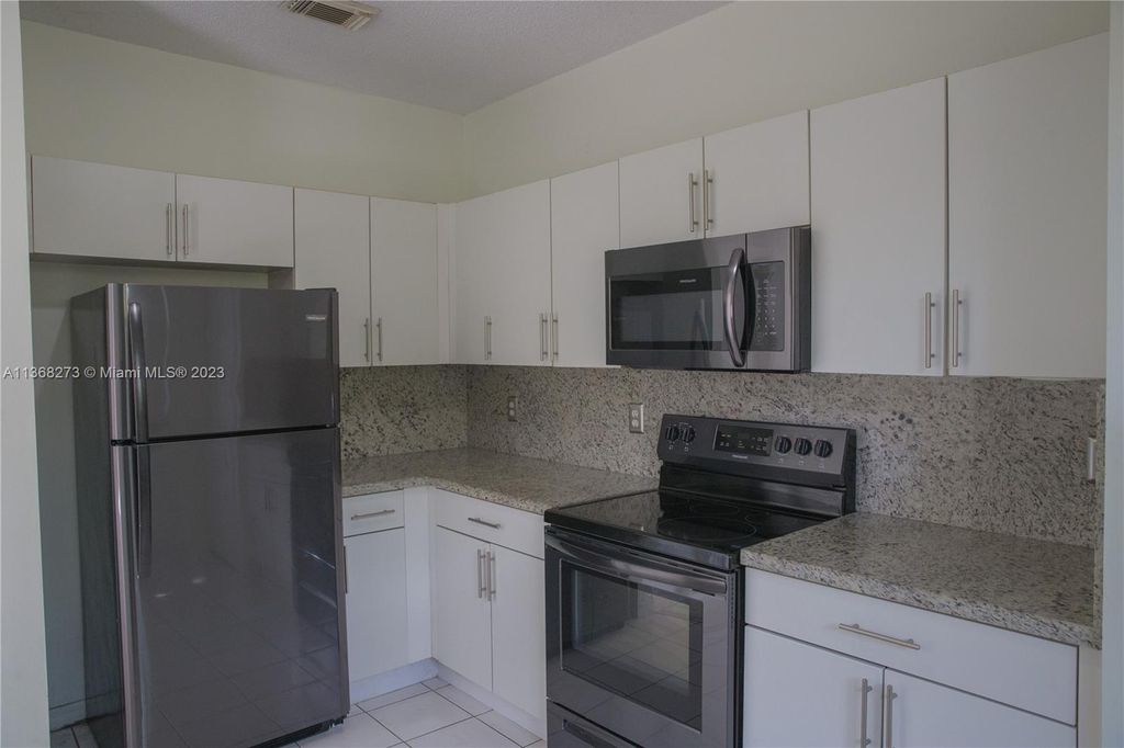 Photo of 2299 NW 161st Ave, Pembroke Pines, FL 33028 (MLS # A11368273)