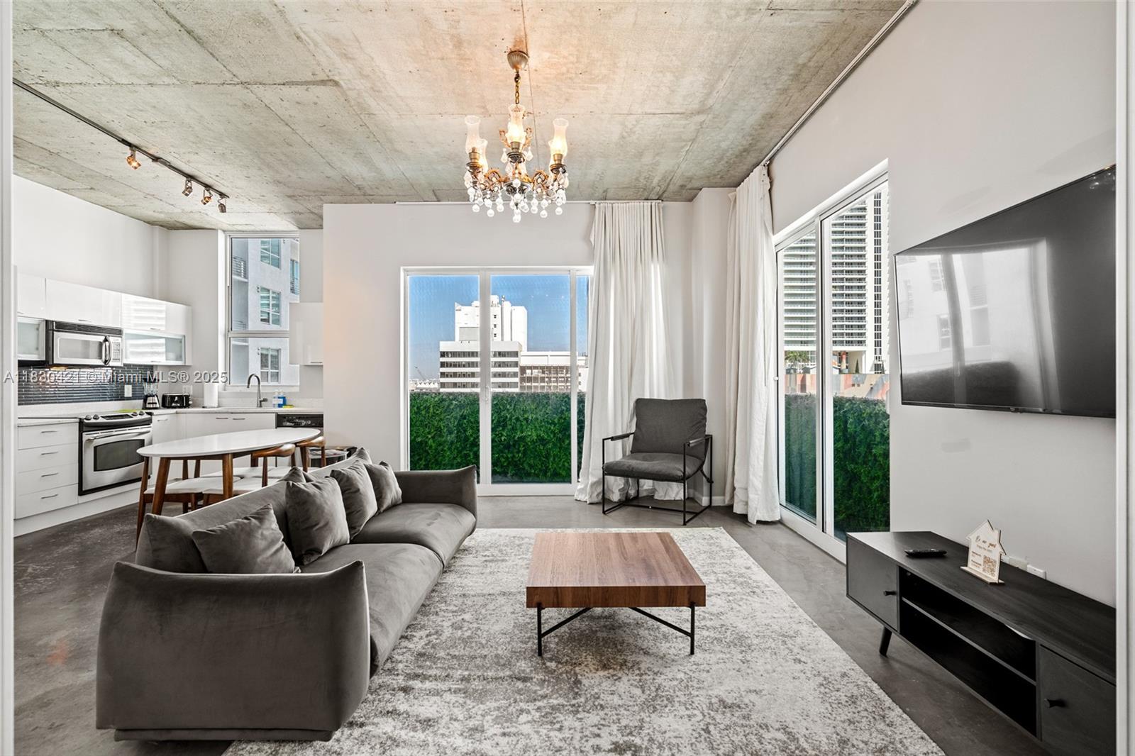 Experience convenience with this stunning fully-furnished 2/2 condo located in the heart of Downtown Miami. Offering breathtaking city views, this residence is thoughtfully designed for your comfort. Inside, you'll find modern conveniences such as an in-unit washer and dryer. The building boasts world-class amenities, including two exquisite pools: one on the rooftop for panoramic views and another on the ground floor for serene relaxation. Stay connected with complimentary wifi and cable included. Perfectly situated within walking distance of lush parks and top-tier restaurants, this condo provides a harmonious blend of luxury and urban living. Embrace the dynamic lifestyle of Miami's bustling downtown while enjoying the tranquility of your personal oasis above the city.