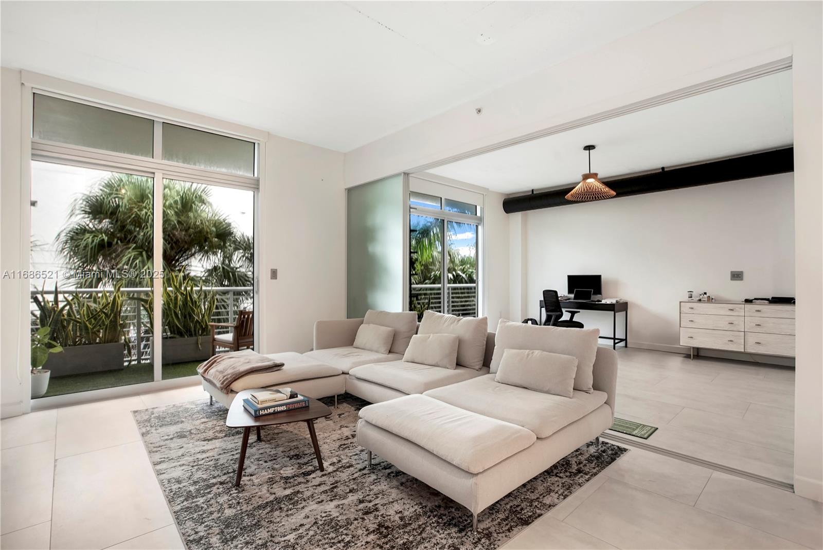 Discover the ultimate Miami Beach lifestyle in this upgraded luxury loft condo! This modern 1-bedroom, 1.5-bath unit features an open loft-style kitchen and living area, a stunning master suite, and is just three blocks from Lincoln Road Mall and across from a golf course.
Enjoy stainless steel appliances, granite countertops, 11.5-foot ceilings, an in-unit washer/dryer, and a private balcony overlooking a courtyard. Building amenities include a rooftop pool with jacuzzi, a weight room, 24-hour security, and secure parking with valet. One assigned covered parking space is included. Experience luxury living at its finest!