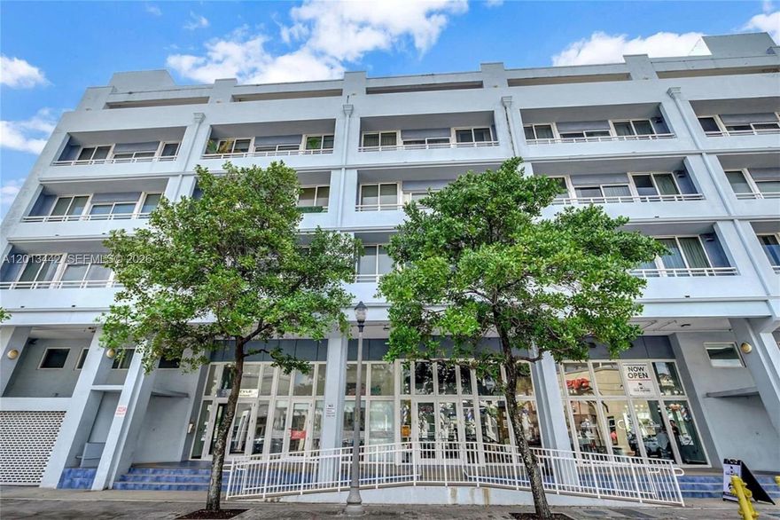 Perfectly positioned in the epicenter of Coconut Grove's Village, Residence 307 at CocoStyle places Peacock Park, Ariete, Greenstreet Café, and Biscayne Bay’s waterfront promenades just moments away. Completely renovated with every detail thoughtfully reimagined, this turnkey, spacious residence feels entirely brand new throughout. The spacious one-bedroom, two-bathroom layout is elevated by high-end designer finishes, including chevron hardwood flooring, Venetian plaster walls, custom LED cove lighting, and floor-to-ceiling sliding glass doors that open to a private balcony overlooking Coconut Grove’s lush tree canopy.  The all-new kitchen features taupe matte cabinetry, brass hardware, and a travertine-inspired backsplash, creating a refined contemporary aesthetic. The luxurious guest bath features a dramatic botanical mosaic walk-in shower, walnut vanity, and illuminated mirror, while the primary full bath offers a soaking tub and shower wrapped in lighter floral mosaic finishes.  A rare flex space functions perfectly as a private office, den, or guest retreat—adding exceptional versatility beyond a typical one-bedroom floor plan.  Residents enjoy a rooftop pool deck with bay views plus one assigned garage parking space.
